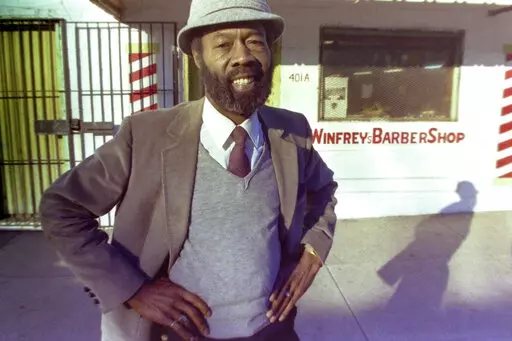 Vernon Winfrey, father of Oprah Winfrey, stands outside his barber shop in Nashville, Tenn., in 1987. Oprah Winfrey confirmed in an Instagram post that her father died Friday, July 8, 2022, at the age of 89. (AP Photo/Mark Humphrey)