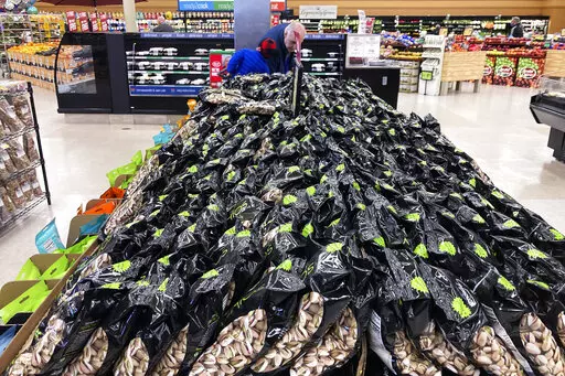 Bags of Pistachios are displayed at a grocery store in Mount Prospect, Ill., on, April 1, 2022. Consumer prices surged 8.6% last month from 12 months earlier, faster than April’s year-over-year surge of 8.3%, the Labor Department said Friday, June 10, 2022. (AP Photo/Nam Y. Huh)