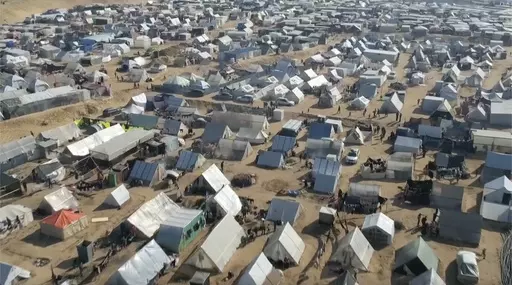 This drone image shows thousands of tents used by displaced people in Rafah, southern Gaza Strip on Friday, Dec. 29, 2023. The United Nations says tens of thousands of Palestinians streamed into the already crowded town at the southernmost end of Gaza in recent days. They are fleeing Israel’s bombardment of the center of the strip. (AP Photo)