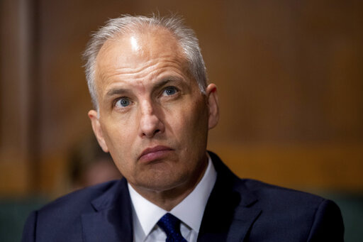 Matthew G. Olsen, of Maryland, nominee to be an Assistant Attorney General for the Department of Justice, attends a Senate Judiciary Hearing on Capitol Hill in Washington on July 14, 2021. The Justice Department is ending its China Initiative. The move announced Wednesday, Feb. 23, 2022, by Assistant Attorney General Olsen amounts to a rebranding of a Trump-era program that was created to crack down on economic espionage by Beijing but that critics said had unfairly scrutinized Chinese professor