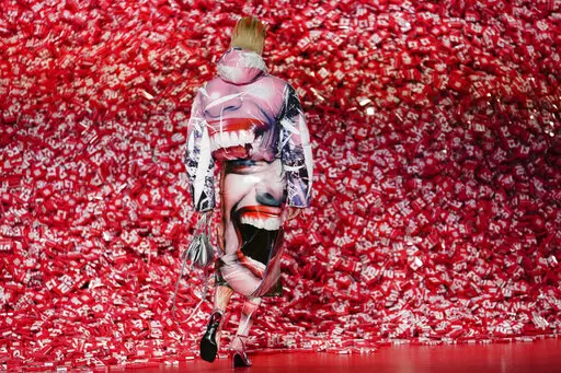 A model wears a creation as part of the Diesel women's Fall-Winter 2023-24 collection presented in Milan, Italy, Wednesday, Feb. 22, 2023. (AP Photo/Luca Bruno)