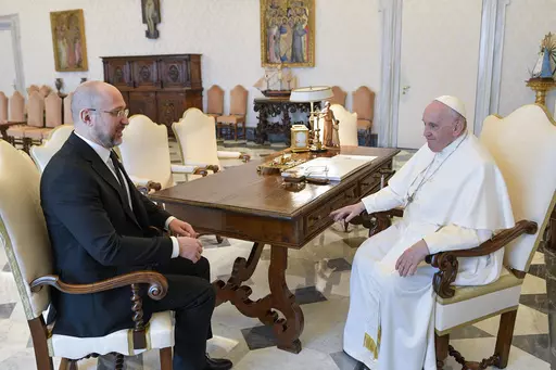 In this picture made available by Vatican Media Ukraine Prime Minister Denys Shmyhal, left, meets with Pope Francis at The Vatican, Thursday, April 27, 2023. (Vatican Media via AP)