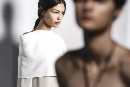 Fashion from Proenza Schouler latest collection is modeled backstage in a first-look setup, during Fashion Week, Saturday Feb. 11, 2023 in New York. (AP Photo/Bebeto Matthews)