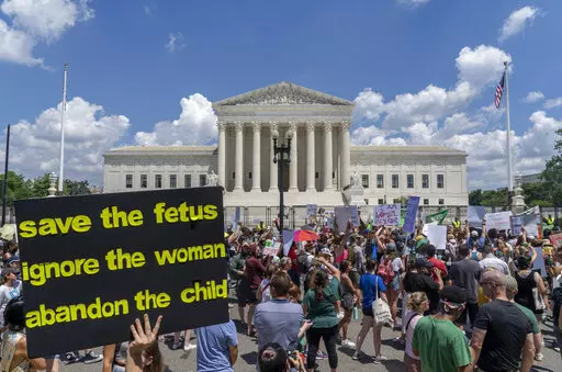 Abortion-rights protesters demonstrate outside the Supreme Court in Washington, Saturday, June 25, 2022. A new poll finds a growing percentage of Americans calling out abortion or women’s rights as priorities for the government in the wake of the Supreme Court’s decision to overturn Roe v. Wade, especially among Democrats and those who support abortion access.  (AP Photo/Gemunu Amarasinghe, File)