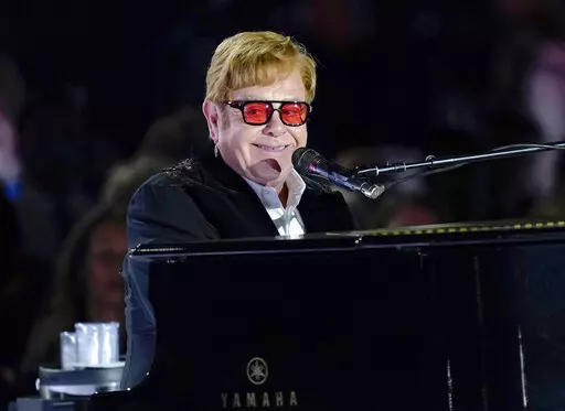 Elton John performs on the South Lawn of the White House in Washington, Friday, Sept. 23, 2022. Elton John is scheduled to perform at the Glastonbury Festival in June, in what organizers say will be his last-ever show in Britain. The festival announced Friday, Dec. 2, 2022 that the star will play the 2023 festival’s final night on June 25 (AP Photo/Susan Walsh, File)
