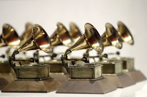 Grammy Awards are displayed at the Grammy Museum Experience at Prudential Center in Newark, N.J. on Oct. 10, 2017. The Recording Academy has announced three new categories to be added to the 2024 Grammy Awards: Best Pop Dance Recording, Best African Music Performance, and Best Alternative Jazz Album. (AP Photo/Julio Cortez, File)