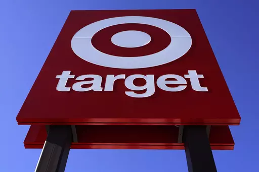 The bullseye logo on a sign outside the Target store in Quincy, Mass., Monday, Feb. 28, 2022. Target says it will stop selling a product dedicated to Civil Rights icons after a now-viral TikTok spotlighted some significant errors. (AP Photo/Charles Krupa, File)