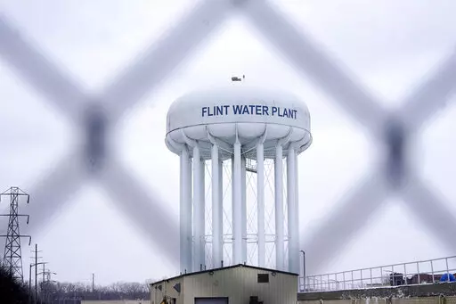 The Flint water plant tower is pictured on Jan. 6, 2022, in Flint, Mich. A judge dismissed criminal charges against former Michigan Gov. Rick Snyder in the Flint water crisis, months after the state Supreme Court said indictments returned by a one-person grand jury were invalid. (AP Photo/Carlos Osorio, File)