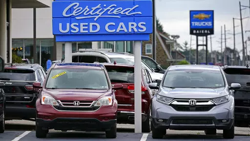 Used car are on display on a lot in Wexford, Pa., Thursday, Sept. 29, 2022. The Commerce Department releases its revised estimate of how the U.S. economy fared in the fourth quarter on Thursday, Feb. 23, 2023. (AP Photo/Gene J. Puskar, File)