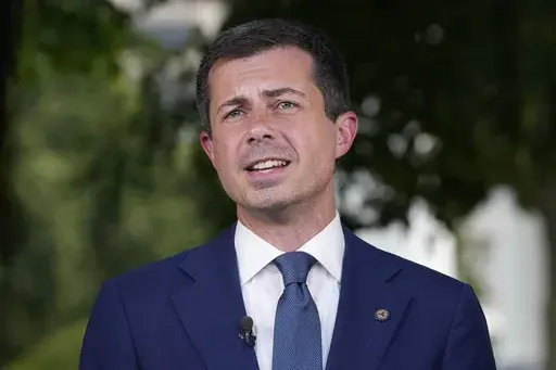 Transportation Secretary Pete Buttigieg talks with reporters at the White House in Washington, July 23, 2024. (AP Photo/Susan Walsh, FIle)
