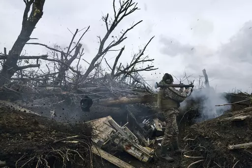 A Ukrainian soldier fires an RPG toward Russian positions at the frontline near Avdiivka, an eastern city where fierce battles against Russian forces have been taking place, in the Donetsk region, Ukraine, on April 28, 2023. Two years after Russia’s full-scale invasion captured nearly a quarter of the country, the stakes could not be higher for Kyiv. After a string of victories in the first year of the war, fortunes have turned for the Ukrainian military, which is dug in, outgunned and outnumb