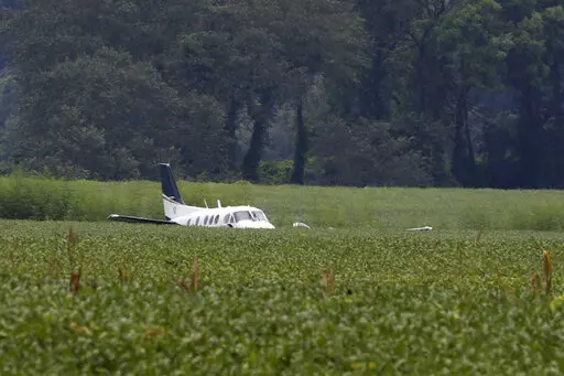 A stolen airplane rests in a field of soybeans after crash-landing near Ripley, Miss., on Sept. 3, 2022. Cory Wayne Patterson, 29, an airport worker who flew a stolen plane erratically over north Mississippi and threatened to crash into a Walmart in September, has died Monday, Nov. 14, 2022, in a federal prison in Miami, where he was being held while awaiting trial. (AP Photo/Nikki Boertman, File)