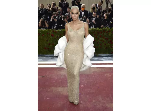 Kim Kardashian wears the iconic dress worn by Marilyn Monroe at The Metropolitan Museum of Art's Costume Institute benefit gala in New York on May 2, 2022.  Some Monroe enthusiasts believe the dress was damaged after Kardashian wore it but the Ripley’s Believe It or Not! attraction in Hollywood, Calif., where the garment is on display, denies that claim. (Photo by Evan Agostini/Invision/AP, File)