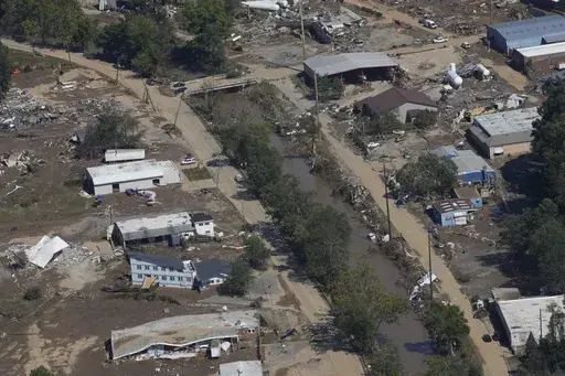 Damage from Hurricane Helene near Asheville, N.C., is seen during an aerial tour for President Joe Biden, Oct. 2, 2024. (AP Photo/Susan Walsh, File)