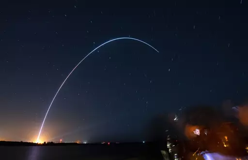 Spectators at Jetty Park in Cape Canaveral, Fla., watch as Terran I, a 3D-printed rocket by Relativity Space, lifts off from Cape Canaveral Space Force Station late Wednesday, March 22, 2023. (Craig Bailey/Florida Today via AP)