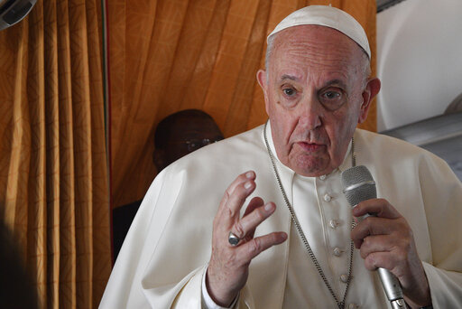 Pope Francis speaks with journalists on board an Alitalia aircraft enroute from Bratislava back to Rome, Wednesday, Sept. 15, 2021 after a four-day pilgrimage to Hungary and Slovakia. (Tiziana Fabi, Pool via AP)
