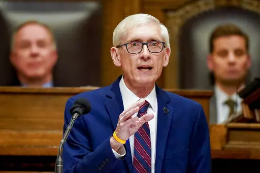 Wisconsin Gov. Tony Evers addresses a joint session of the Legislature in the Assembly chambers during the governor's State of the State speech at the state Capitol on Tuesday, Feb. 15, 2022, in Madison, Wis. Evers, who is up for reelection in November, vetoed a package of bills on Friday, April 8, 2022, passed by the Republican-controlled Legislature that would have made a series of changes to the battleground state's election laws. (AP Photo/Andy Manis, File)