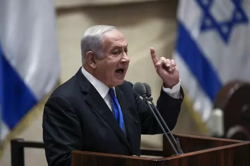 Former Israeli Prime Minister Benjamin Netanyahu speaks at the Knesset, Israel's parliament, in Jerusalem, June 30, 2022.  Israel is holding its fifth national election in under four years, and once again the race is shaping up as a referendum on  Netanyahu’s fitness to rule.  (AP Photo/Ariel Schalit, File