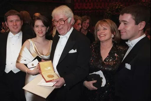 Irish poet Seamus Heaney, center, displays his Nobel literature prize medal, surrounded by his family, after receiving it from the Swedish King Carl XVI Gustaf at the Concert Hall in Stockholm, Sweden on Dec. 10, 1995. Heaney's family are from left: his son Michael, daughter Catherine, his wife Marie and son Christopher. Presidents have long made a point of citing a favorite writer, and for President Joe Biden that often has been Heaney, renowned for what Nobel judges in 1995 called “works of 