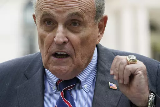 Former New York City Mayor Rudy Giuliani speaks during a news conference, Tuesday, June 7, 2022, in New York. In a legal complaint filed in New York, Monday, May 15, 2023, a woman who says she worked as an off-the-books employee for Giuliani during his stint as Donald Trump’s personal lawyer alleges that the former New York City mayor coerced her into sex and owes her nearly $2 million in unpaid wages. (AP Photo/Mary Altaffer, File)