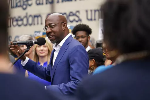 Democratic nominee for U.S. Senate Sen. Raphael Warnock speaks during a news conference, Thursday, Nov. 10, 2022, in Atlanta. Warnock is running against Republican Herschel Walker in a runoff election. (AP Photo/Brynn Anderson)