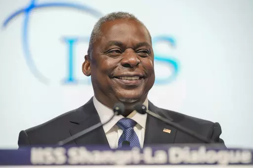U.S. Secretary of Defense Lloyd J. Austin III smiles as he speaks during the 20th International Institute for Strategic Studies (IISS) Shangri-La Dialogue, Asia's annual defense and security forum in Singapore, Saturday, June 3, 2023. (AP Photo/Vincent Thian)
