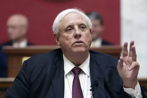 West Virginia Gov. Jim Justice speaks in the House Chambers at the state capitol in Charleston, W.Va., on Jan. 11, 2023. Gov. Justice on Wednesday, March 29, 2023, signed a bill banning gender-affirming care for minors, joining at least 10 other states that have enacted laws restricting or outlawing medically supported treatments for transgender youth. (AP Photo/Chris Jackson, File)
