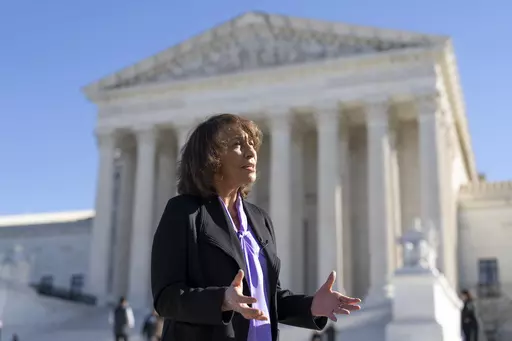 Ruth Glenn, a domestic violence survivor, speaks with The Associated Press as she discusses a case before the Supreme Court that is focused on a law aiming to keep guns out of the hands of abusers, in Washington, Monday, Oct. 23, 2023. Glenn is the president of the National Coalition Against Domestic Violence. (AP Photo/J. Scott Applewhite)