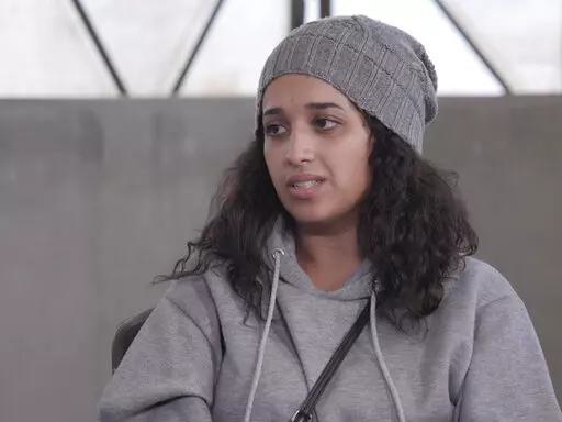 In this image taken from video Hoda Muthana talks during an interview in Roj detention camp in Syria where she is being held by U.S.-allied Kurdish forces, Wednesday, Nov. 9, 2022. Muthana, who ran away from home in Alabama at the age of 20, joined the Islamic State group and had a child with one of its fighters says she still hopes to return to the United States, serve prison time if necessary, and advocate against the extremists. (AP Photo/The News Movement)