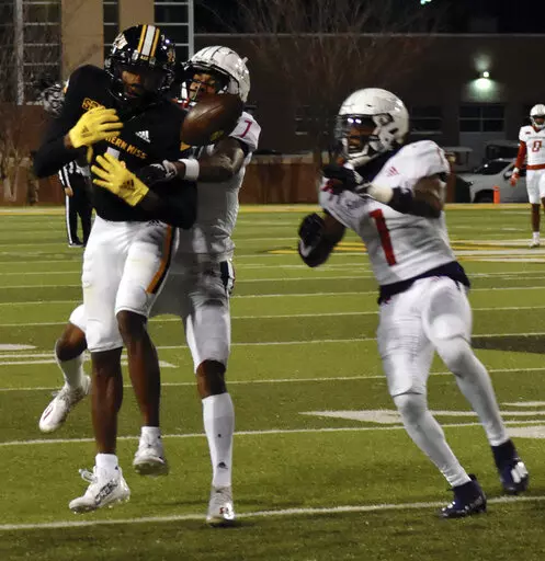 Southern Mississippi wide receiver Jason Brownlee drops a pass against South Alabama in the fourth quarter of an NCAA college football game in Hattiesburg, Miss., Saturday, Nov. 19, 2022. (Aimee Cronan/The Gazebo Gazette via AP)