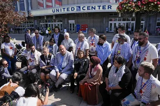 Uncommitted delegates hold a press conference outside the United Center before the Democratic National Convention Thursday, Aug. 22, 2024, in Chicago. (AP Photo/Matt Rourke)