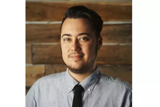 Tis 2022 photo shows a self-portrait of Maxwell Kuzma, a transgender man working as a film editor and writer living outside of Columbus in rural Ohio. Kuzma expressed dismay at a Vatican document issued Monday, April 8, 2024, that rejected the idea that one’s biological sex can change. (Maxwell Kuzma via AP)