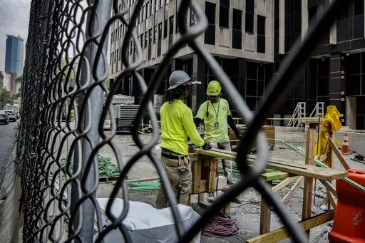 Construction workers work with rebar at a site on Tuesday June 6, 2023, in New York. On Friday, The U.S. government issues the June jobs report. (AP Photo/Bebeto Matthews, File)