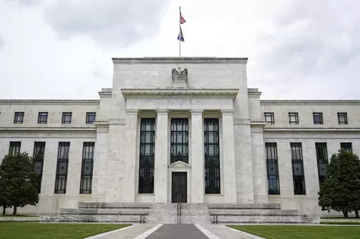 This May 4, 2021, file photo shows the Federal Reserve building in Washington. The Federal Reserve is poised this week to begin unleashing its most drastic steps in three decades to attack inflation by making it costlier to borrow — for a car, a home, a business deal, a credit card purchase — all of which will compound Americans' financial strains and likely weaken the economy. The Fed is expected to announce Wednesday, May 3, 2022 that it will begin quickly shrinking its vast stockpile of T
