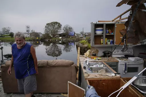 Philip Adams walks through what remains of his living room and kitchen at his hurricane destroyed home in the aftermath of Hurricane Ida, on Sept. 6, 2021, in Lockport, La. Experts caution that attributing any single event to La Nina or its better-known cousin, El Nino, is difficult as they pronounced Thursday, March 9, 2023, that the La Nina weather phenomenon has come to an end. But they can say generally that tornadoes in the Southeast and hurricanes are more frequent during La Nina. (AP Phot