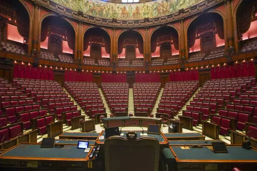 A view of the hemicycle inside Italy's Lower Chamber Montecitorio Palace, in Rome, Wednesday, Sept. 16, 2020. Forming a new government in Italy involves time and decades-old rituals, so although far-right leader Giorgia Meloni emerged as the clear winner in elections last month, the process of getting a new ruling coalition up and running will take time, maybe weeks. (AP Photo/Andrew Medichini, File)