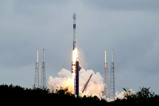 A SpaceX Falcon 9 rocket lifts off from the Cape Canaveral Space Force Station, Monday, Oct. 7, 2024 at Cape Canaveral, Fla., carrying a European spacecraft to an asteroid. (AP Photo/John Raoux)