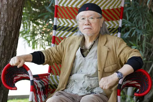 Manga artist Leiji Matsumoto poses for portraits at the 70th edition of the Venice Film Festival held from Aug. 28 through Sept. 7, in Venice, Italy, on Sept. 3, 2013. Matsumoto died of acute heart failure in a Tokyo hospital on Feb. 13, 2023, his office, Studio Leijisha, said Monday, Feb. 20, 2023. (AP Photo/Domenico Stinellis, File)