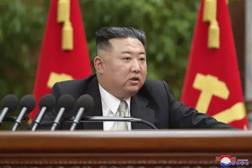 In this photo provided by the North Korean government, North Korean leader Kim Jong Un speaks during a plenary meeting of the Workers’ Party of Korea at the party headquarters in Pyongyang, North Korea Tuesday, Dec. 27, 2022. Independent journalists were not given access to cover the event depicted in this image distributed by the North Korean government. The content of this image is as provided and cannot be independently verified. Korean language watermark on image as provided by source read