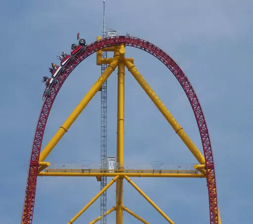 Riders on the Top Thrill Dragster speed along on May 1, 2003, at Cedar Point Amusement Park, in Sandusky, Ohio. The amusement park in Ohio is permanently closing the world’s second-tallest roller coaster. The decision announced Tuesday, Sept. 6, 2022, by Cedar Point comes a year after a small metal object flew off the 420-foot (128-meter) tall Top Thrill Dragster coaster and struck a woman in the head at the park in Sandusky. (AP Photo/Paul M. Walsh, File)