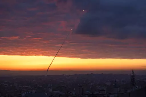 Anti-aircraft missiles are launched from the Gaza Strip after an Israeli airstrike, Thursday, Feb. 23, 2023. The Israeli military said Palestinian militants fired six rockets toward the country's south early Thursday. Israeli aircraft then struck several targets in northern and central Gaza. There were no reports of injuries in Israel or Gaza. The rocket fire followed a deadly Israeli military raid in the West Bank on Wednesday. (AP Photo/Fatima Shbair)