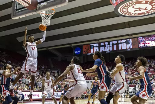 Alabama forward Brandon Miller (24) rebounds against Mississippi during the first half of an NCAA college basketball game, Tuesday, Jan. 3, 2023, in Tuscaloosa, Ala. (AP Photo/Vasha Hunt)