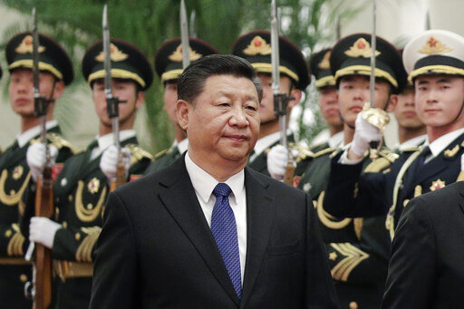 Chinese President Xi Jinping and Finnish President Sauli Niinisto (unseen) review an honor guard at the Great Hall of the People in Beijing, Monday, Jan. 14, 2019. With Russia’s military failings in Ukraine mounting, no country is paying closer attention than China to how a smaller, outgunned force has badly bloodied what was thought to be one of the world’s strongest armies. (AP Photo/Andy Wong, File)