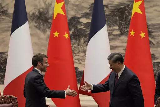 French President Emmanuel Macron, left, shakes hands with Chinese President Xi Jinping after meeting the press at the Great Hall of the People in Beijing, on April 6, 2023. In the weeks since Chinese leader Xi Jinping won a third five-year term as president, setting him on course to remain in power for life, leaders and diplomats from around the world have beaten a path to his door. None more so than those from Europe. (AP Photo/Ng Han Guan, Pool, File)