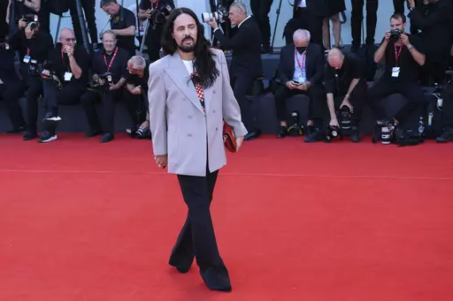 Alessandro Michele poses for photographers upon arrival at the premiere of the film 'Don't Worry Darling' during the 79th edition of the Venice Film Festival in Venice, Italy, on Sept. 5, 2022. The flamboyant former designer of Gucci Alessandro Michele has been named the new creative director at storied Roman luxury house Valentino, following the sudden departure last week of Pierpaolo Piccioli after 25 years. Valentino confirmed the move in a statement Thursday March 28, 2024. (Photo by Joel C 