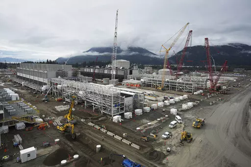 The LNG Canada industrial energy project is under construction in Kitimat, British Columbia, Sept. 28, 2022. The war-inspired natural gas boom is undermining already insufficient efforts to limit future warming to just a few more tenths of a degree, according to a new report released Thursday, Nov. 10, by Climate Action Tracker. (Darryl Dyck/The Canadian Press via AP, File)