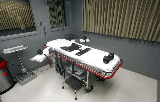The execution room at the Oregon State Penitentiary is pictured on Nov. 18, 2011, in Salem, Ore. Oregon Gov. Kate Brown announced on Tuesday, Dec. 13, 2022, she is commuting the sentences of the 17 prison inmates in Oregon who have been sentenced to death to life imprisonment without the possibility of parole. (AP Photo/Rick Bowmer, File)
