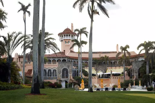President Donald Trump's Mar-a-Lago estate is seen from the media van in the presidential motorcade in Palm Beach, Fla., March 24, 2018, en route to Trump International Golf Club in West Palm Beach, Fla. Christina Bobb, a lawyer for former president Donald Trump who signed a letter stating that a “diligent search” for classified records had been conducted and that all such documents had been given back to the government has spoken with the FBI, according to a person familiar with the matter.