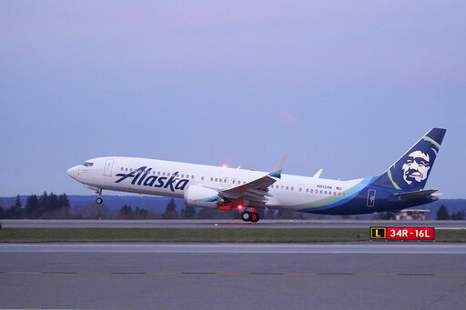 The first Alaska Airlines passenger flight on a Boeing 737-9 Max airplane takes off, Monday, March 1, 2021, on a flight to San Diego from Seattle-Tacoma International Airport in Seattle. The subscription pricing model is trending in the travel industry. Alaska Airlines recently launched a subscription service for West Coast flyers, offering 1-cent flights (on top of a monthly fee) for flights between California, Nevada and Arizona.  (AP Photo/Ted S. Warren, File)