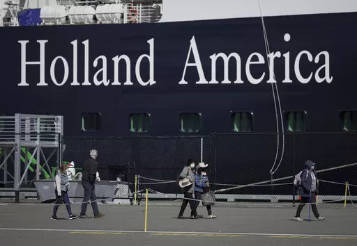 A Holland America cruise ship is shown in Victoria, Canada on Saturday, April 9, 2022. Two crew members on a Holland America cruise ship died during an “incident” in the ship's engineering space, the cruise line said. The unidentified crew members died Friday, March 22, 2024, while the Florida-based Nieuw Amsterdam was at Half Moon Cay in the Bahamas, Holland America said in a statement.(Darryl Dyck/The Canadian Press via AP)